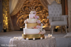 Stunning pink roses decoration for Indian wedding cake. Stunning pink roses decoration for Indian wedding cake.