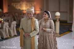 Indian couple walking down the aisle capture. Indian couple walking down the aisle capture.