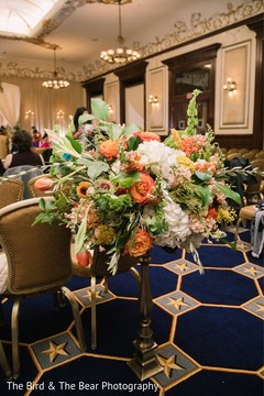 Floral arrangement details of the Indian wedding venue. Floral arrangement details of the Indian wedding venue.