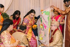 Indian bride wearing the ruby and orange sherbet bridal saree. Indian bride wearing the ruby and orange sherbet bridal saree.
