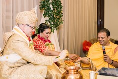 Pundit with the Maharani and Raja during rituals. Pundit with the Maharani and Raja during rituals.