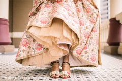Indian bride showing her feet henna art and saree. Indian bride showing her feet henna art and saree.