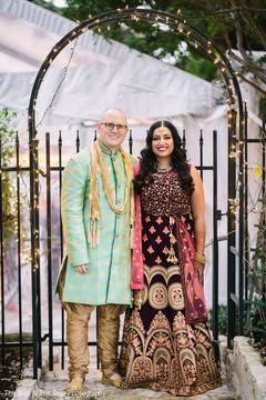 Indian groom wearing the teal sherwani posing with the Maharani. Indian groom wearing the teal sherwani posing with the Maharani.