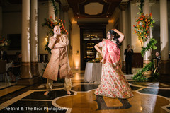 Indian couple performing a choreography during the reception. Indian couple performing a choreography during the reception.