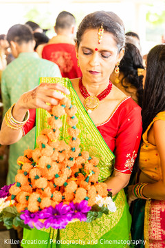 Indian relative holding decorative necklaces. Indian relative holding decorative necklaces.