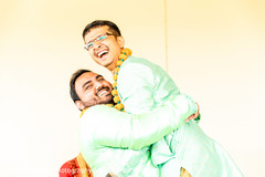 Indian groomsmen hugging. Indian groomsmen hugging.