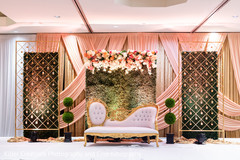 Stage decorated with flowers for Hindu reception. Stage decorated with flowers for Hindu reception.