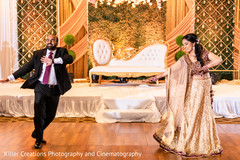 Indian bride and her Indian groom performing for their guests. Indian bride and her Indian groom performing for their guests.