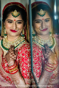 Indian bride showing her jewels and mehndi art. Indian bride showing her jewels and mehndi art.