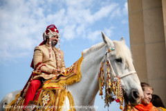 Indian groom smiling during his baraat photo shoot. Indian groom smiling during his baraat photo shoot.