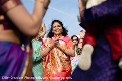 Indian relative smiling during the barat parade. Indian relative smiling during the barat parade.