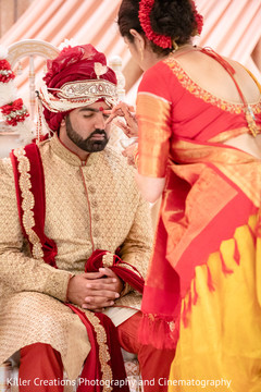 Indian groom receiving the bottu. Indian groom receiving the bottu.