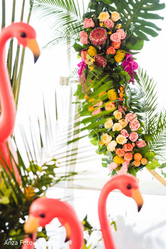 Yellow, pink and orange roses and decorations for Indian wedding. Yellow, pink and orange roses and decorations for Indian wedding.