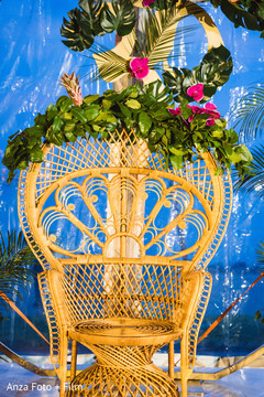 Mehndi party seat tropical flowers decorations. Mehndi party seat tropical flowers decorations.