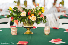 Indian wedding table roses and tropical flowers decoration. Indian wedding table roses and tropical flowers decoration.