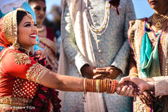 Indian bride holding indian grooms hand. Indian bride holding indian grooms hand.