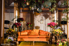 Orange, red, yellow and golden Indian wedding stage decor. Orange, red, yellow and golden Indian wedding stage decor.