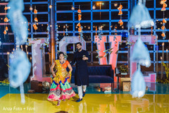 Indian couple about to dance at their Sangeet party. Indian couple about to dance at their Sangeet party.