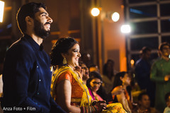 Indian couple smiling at sangeet party. Indian couple smiling at sangeet party.
