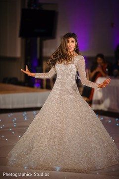 Indian bride wearing the ivory-toned saree. Indian bride wearing the ivory-toned saree.