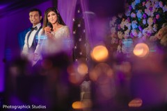 Indian bride and groom delivering a speech for guests. Indian bride and groom delivering a speech for guests.