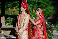 Indian bride and groom having their first look. Indian bride and groom having their first look.