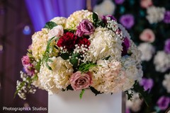 Indian wedding floral arrangement decor detail. Indian wedding floral arrangement decor detail.