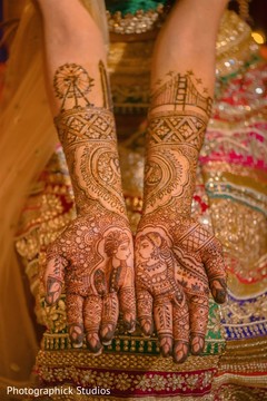 Indian bride showing her amazing mehndi design. Indian bride showing her amazing mehndi design.