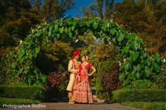 Maharani and Raja wearing the traditional attires outdoors. Maharani and Raja wearing the traditional attires outdoors.