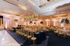 Tables and chairs decorated for Hindu wedding reception. Tables and chairs decorated for Hindu wedding reception.