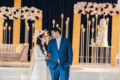 Indian couple in formal wear looking at each other. Indian couple in formal wear looking at each other.