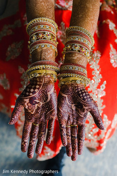Indian bride showing her palms filled with mehdni art. Indian bride showing her palms filled with mehdni art.