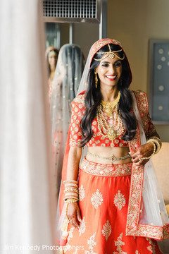 Indian bride displaying her Hindu wedding clothes. Indian bride displaying her Hindu wedding clothes.