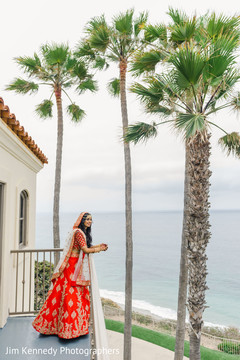 Indian bride posing for picture on the balcony. Indian bride posing for picture on the balcony.