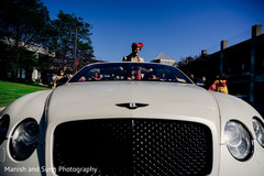 Indian groom on his luxurious baraat vehicle white pearl color. Indian groom on his luxurious baraat vehicle white pearl color.