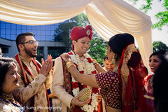 Indian bride and groom at the milni rituals. Indian bride and groom at the milni rituals.