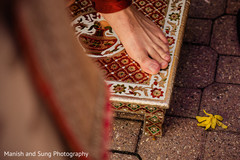 Golden, red and white Milni stepping table for Indian groom. Golden, red and white Milni stepping table for Indian groom.