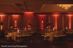 Indian wedding reception table lights and flowers decor. Indian wedding reception table lights and flowers decor.