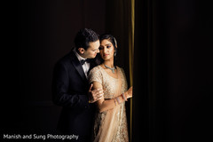Ravishing indian couple on their reception outfits. Ravishing indian couple on their reception outfits.