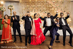 Indian relatives with groomsmen dancing capture. Indian relatives with groomsmen dancing capture.