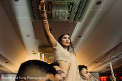Maharani lifted by groomsmen at reception party. Maharani lifted by groomsmen at reception party.