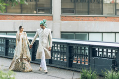 Maharani and Indian groom holding hands during the photoshoot. Maharani and Indian groom holding hands during the photoshoot.
