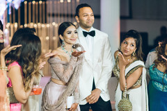 Indian bride with Raja during the reception portraits. Indian bride with Raja during the reception portraits.