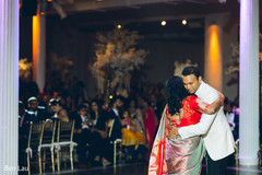 Indian groom dancing during the Indian wedding reception gala. Indian groom dancing during the Indian wedding reception gala.