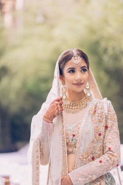 Portrait of Maharani wearing the beige bridal saree. Portrait of Maharani wearing the beige bridal saree.