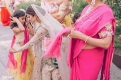 Indian bride with kid guest prior to the ceremony. Indian bride with kid guest prior to the ceremony.