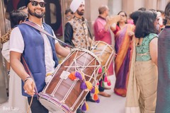 Dhol player during the Indian wedding baraat. Dhol player during the Indian wedding baraat.