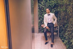 Raja wearing the reception tuxedo posing for pictures. Raja wearing the reception tuxedo posing for pictures.