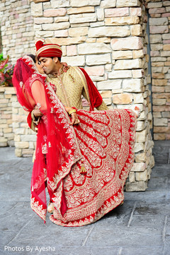 Indian groom kissing his Maharani. Indian groom kissing his Maharani.