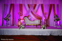Stage decorated with flowers for Hindu wedding reception. Stage decorated with flowers for Hindu wedding reception.